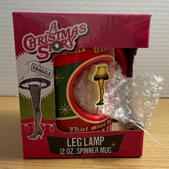 A Christmas Story Leg Lamp Spinner Mug 12 oz Coffee Cup Brand New in Box - Picture 1 of 4